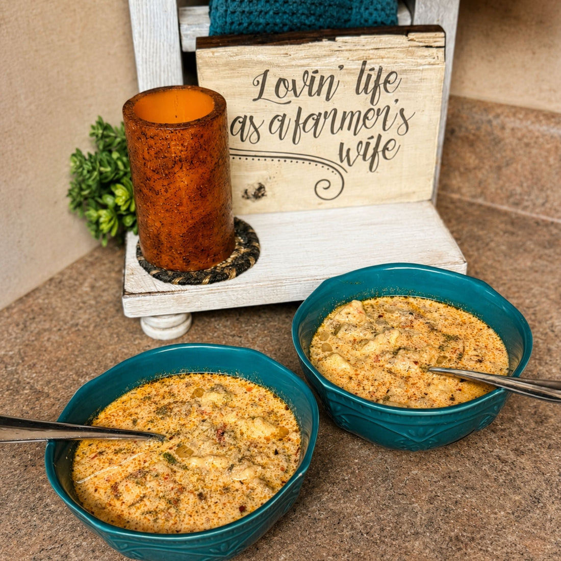 Two bowls of creamy Italian sausage gnocchi soup with homemade potato gnocchi